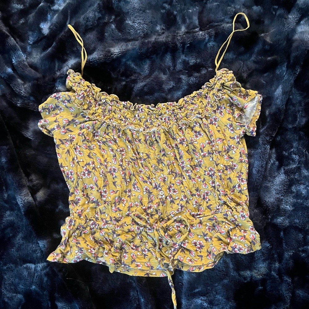 Yellow off the shoulder crop top with faux button up front and bows on sleeves.